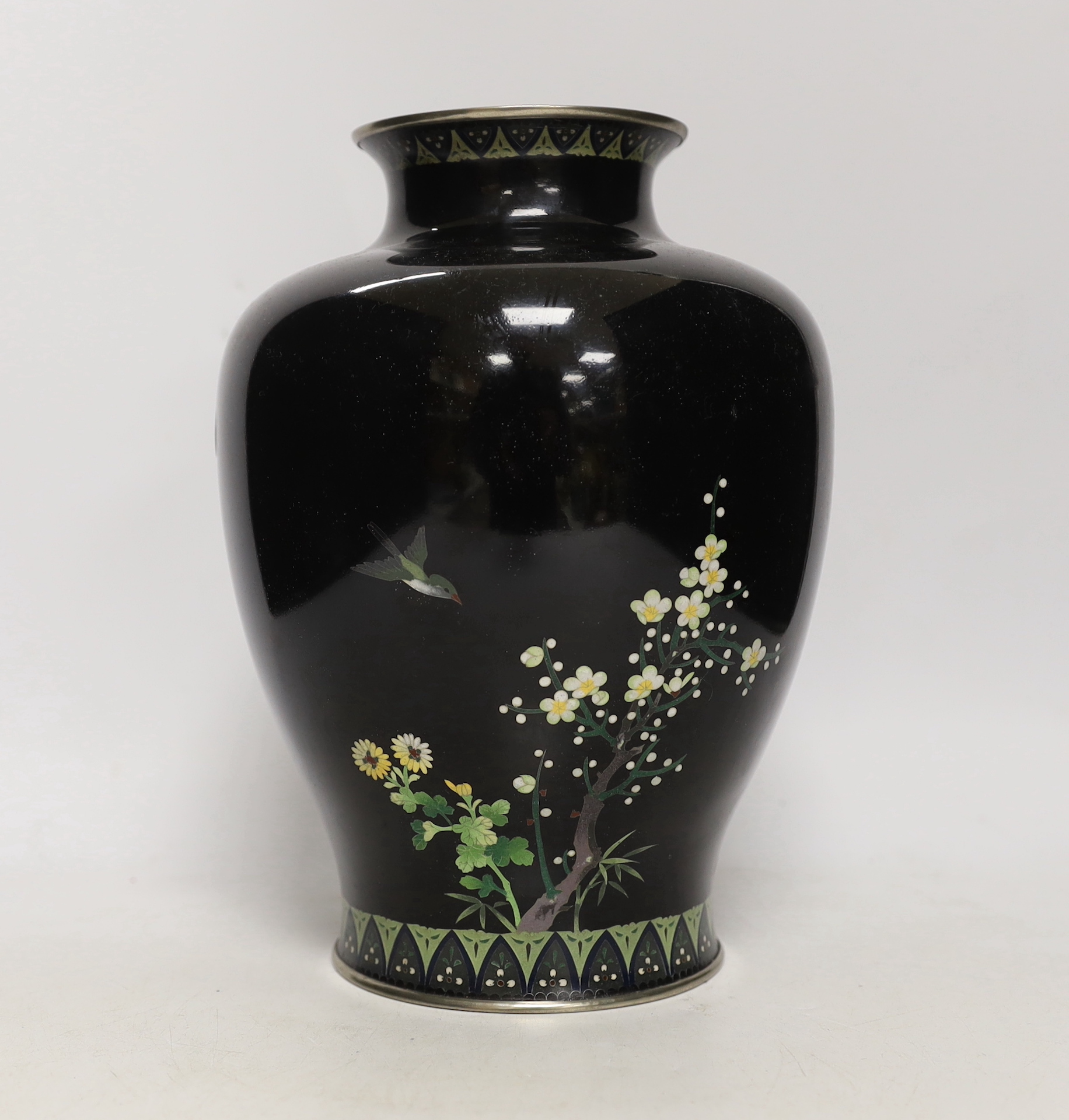 A Japanese silver wire cloisonné enamel vase, early 20th century, enamelled with birds and flowers, 25cm high